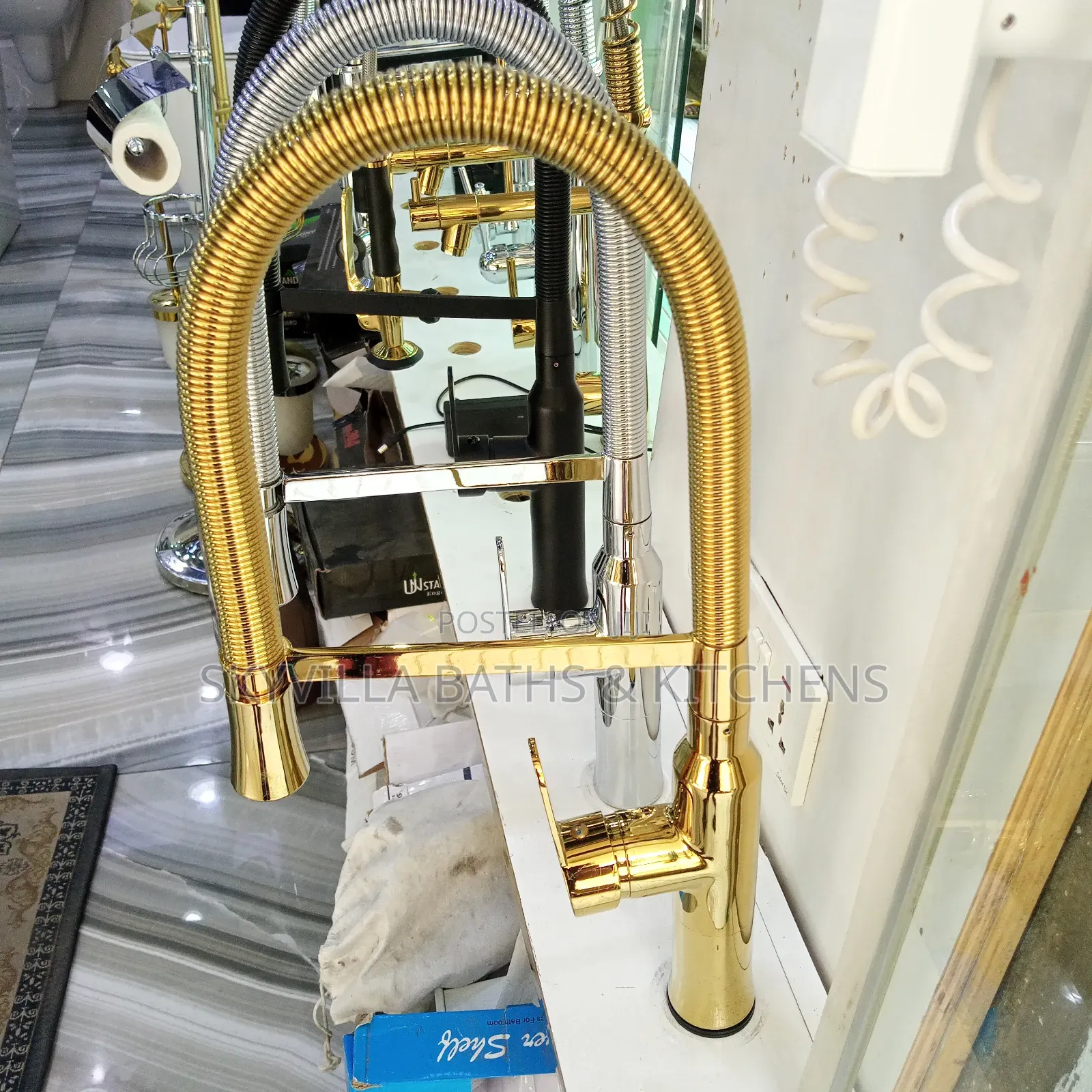 Gold Coloured Flexible Sink Mixer.