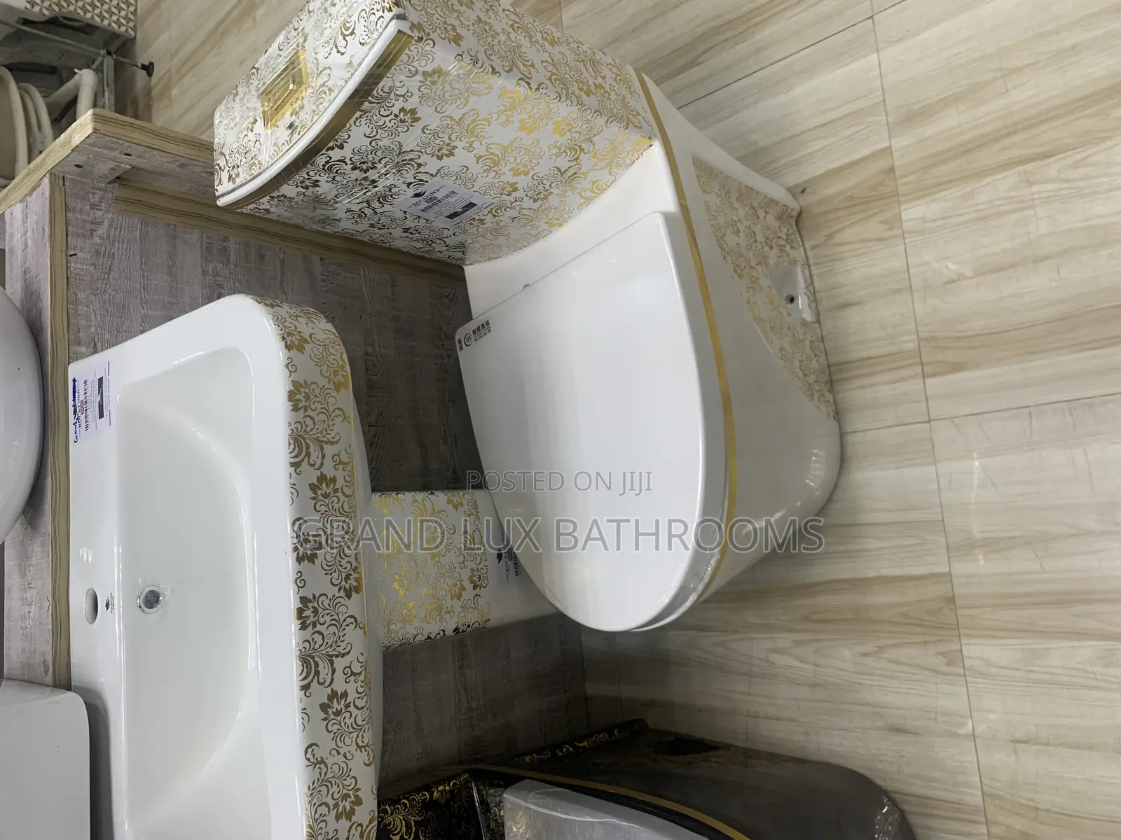 **Luxurious Gold Floral Ceramic Toilet and Sink Set**
