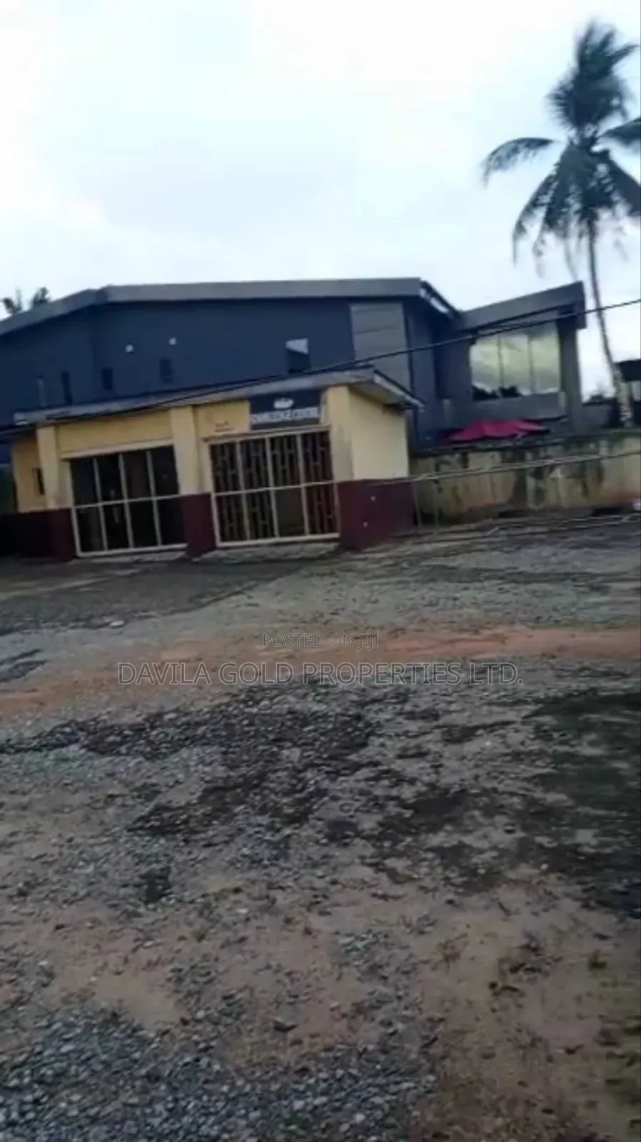 A Land With a Building for Sale