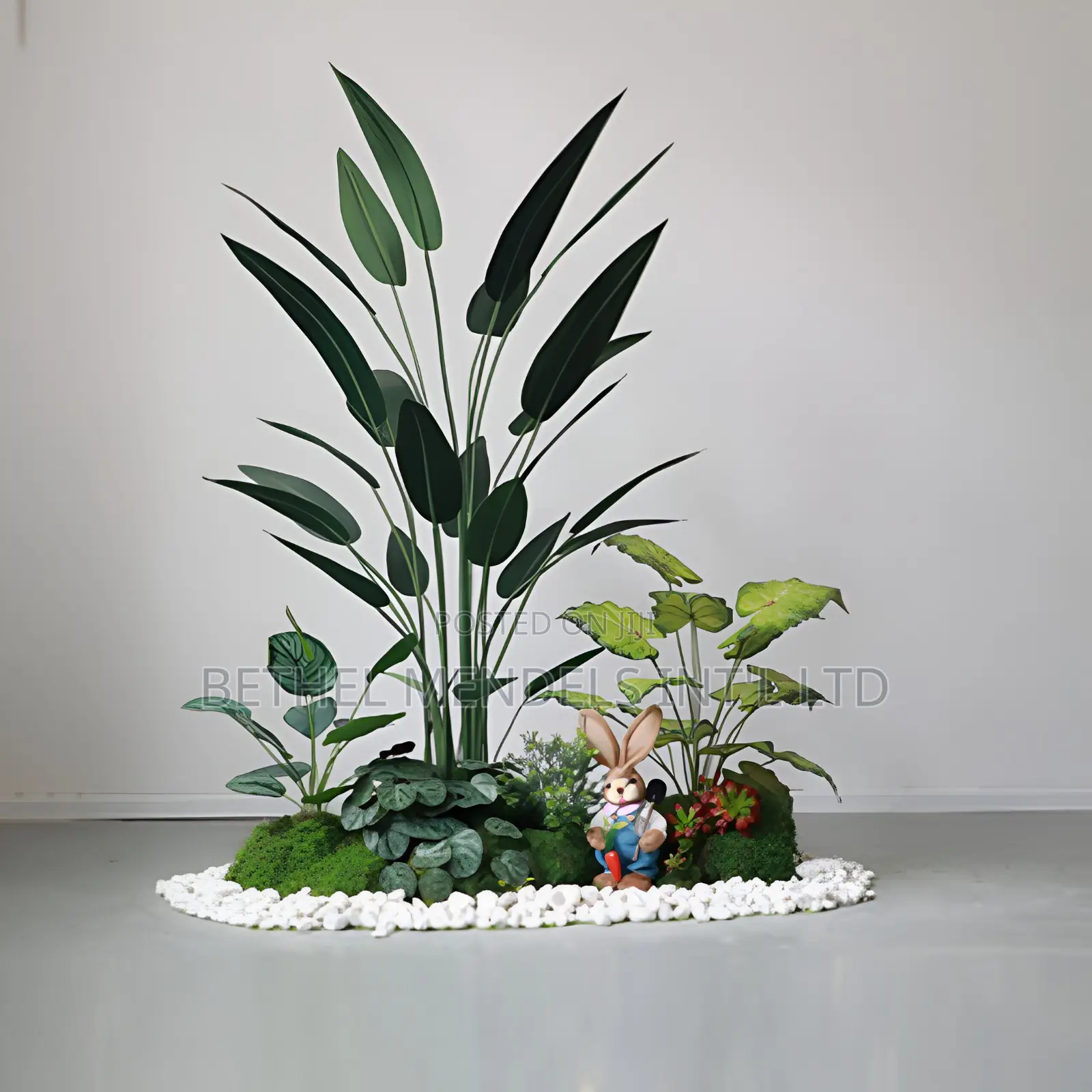 Home Landscaping Design With White Stone And Green Moss