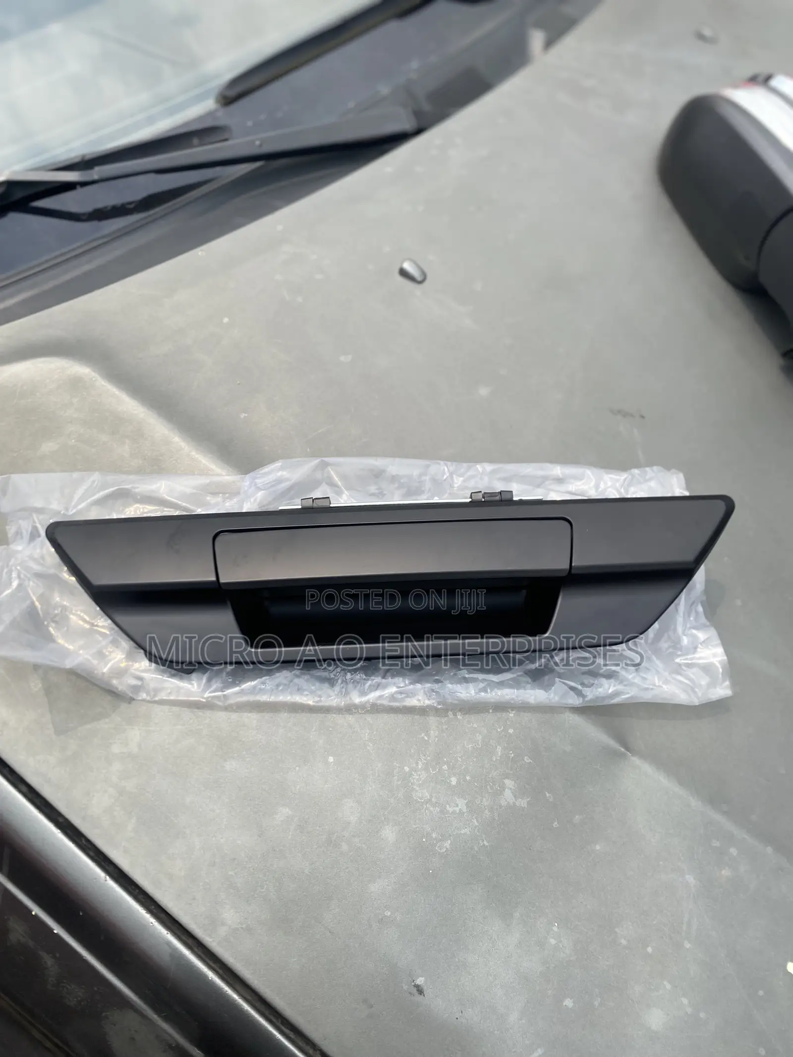 Tail Board Opener