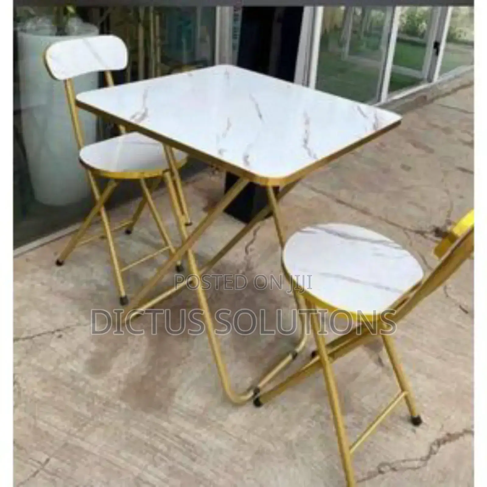 A Set of 2 Chairs and 1 Table