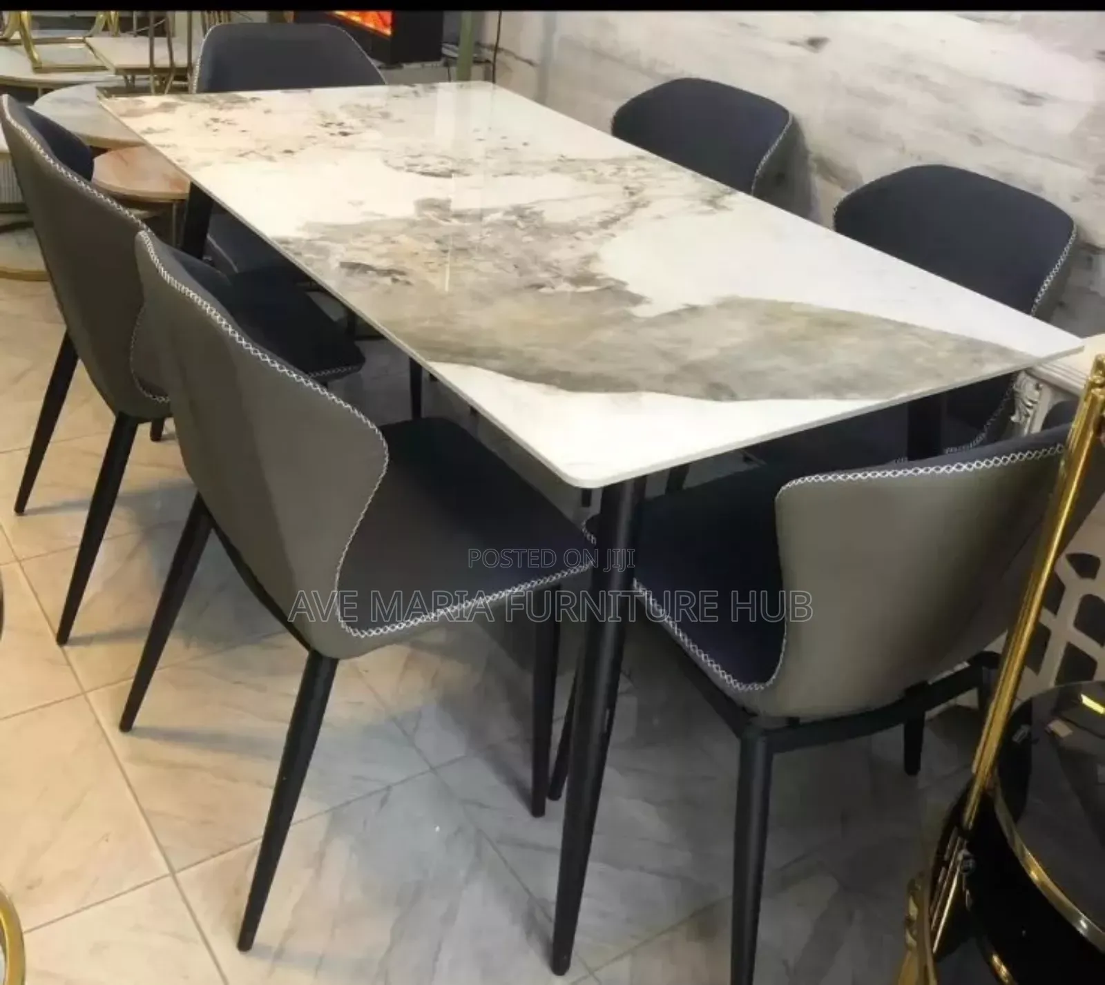 Set of Marble Top Dining Table and Six Leather Chairs.