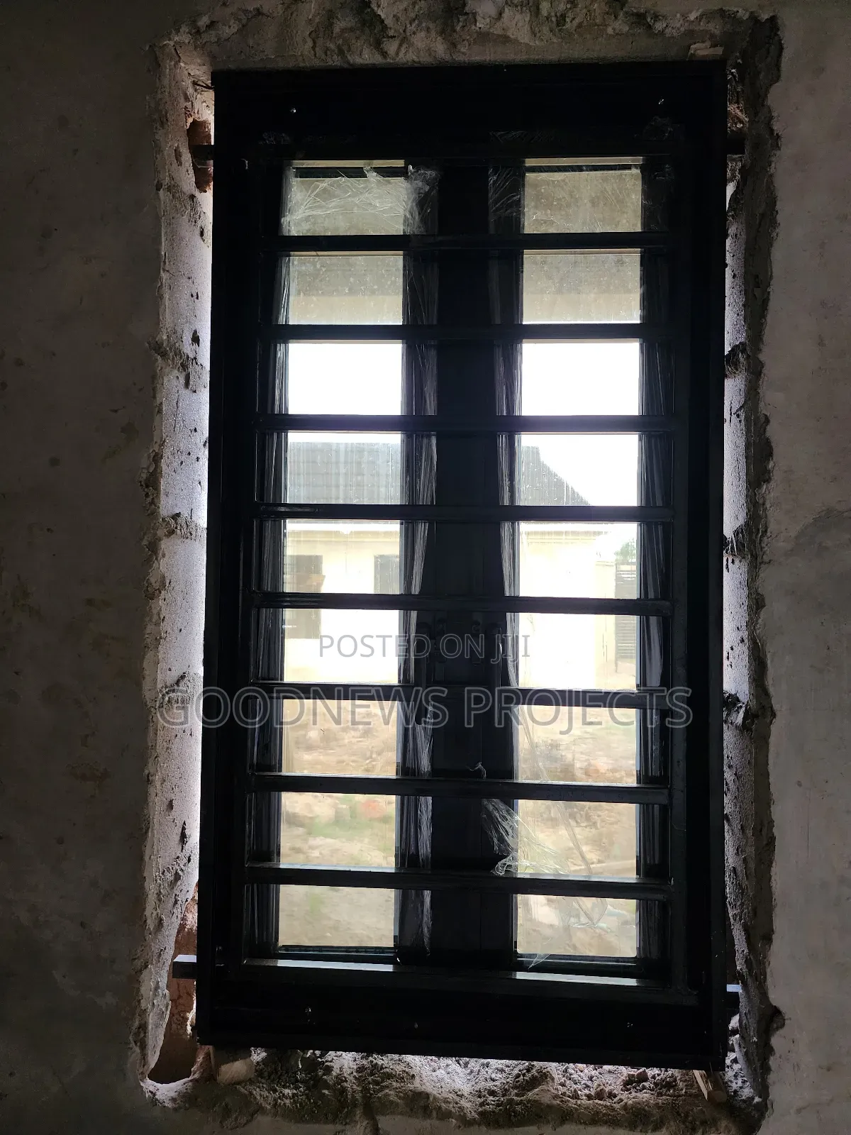 Black Casement Window With {Iron Burglary} and Nets