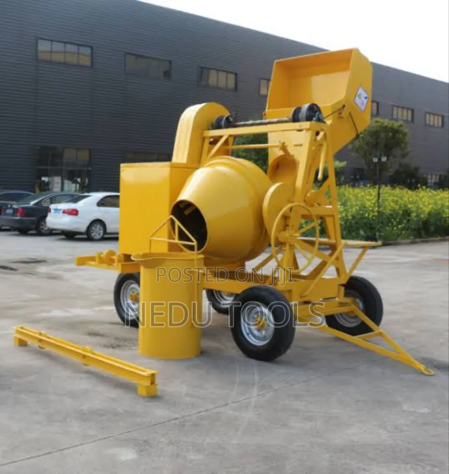 Self Load Concrete Mixer With Hoist