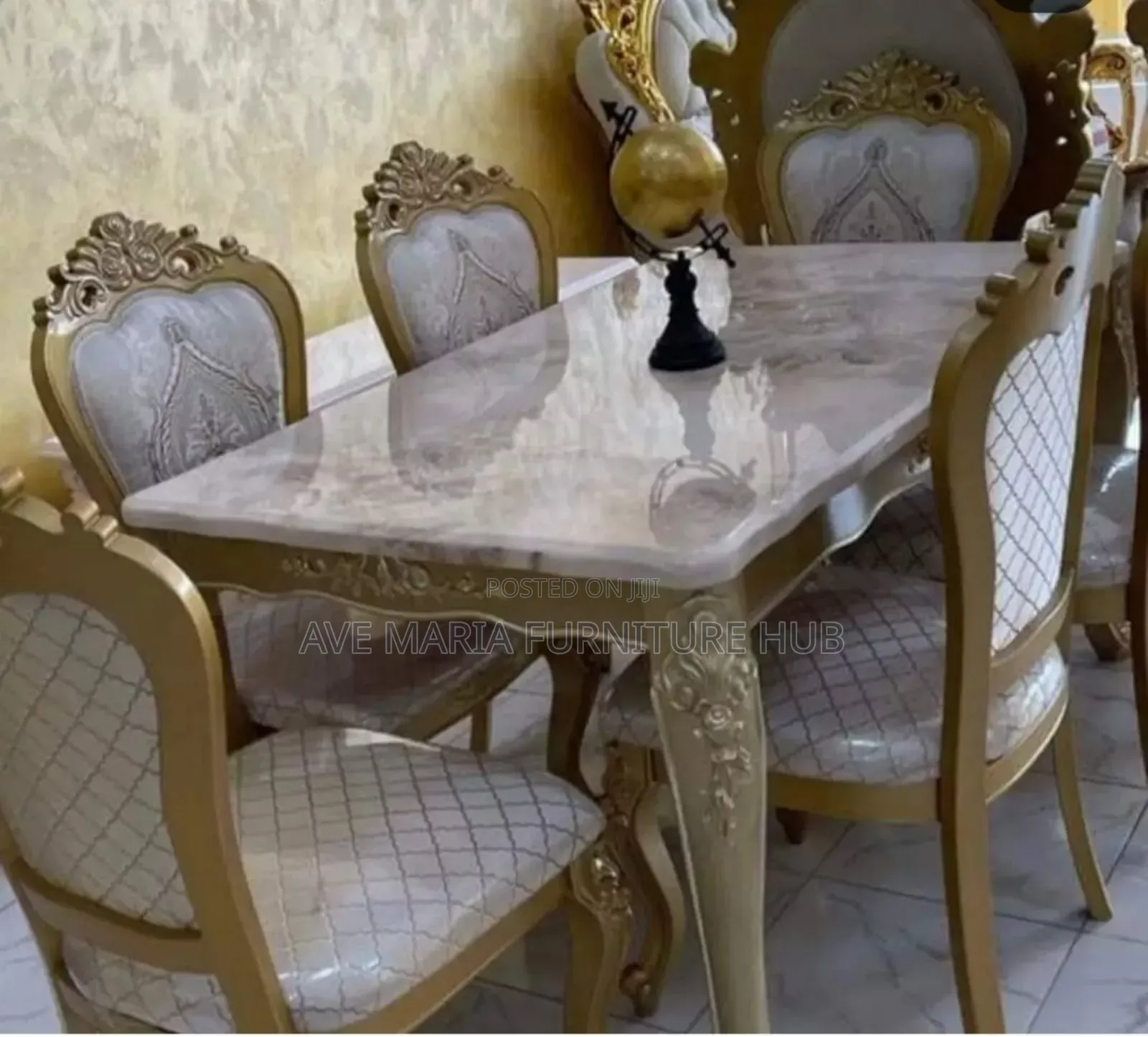 Set of Royal Marble Dining Table With Six Fabric Chairs.