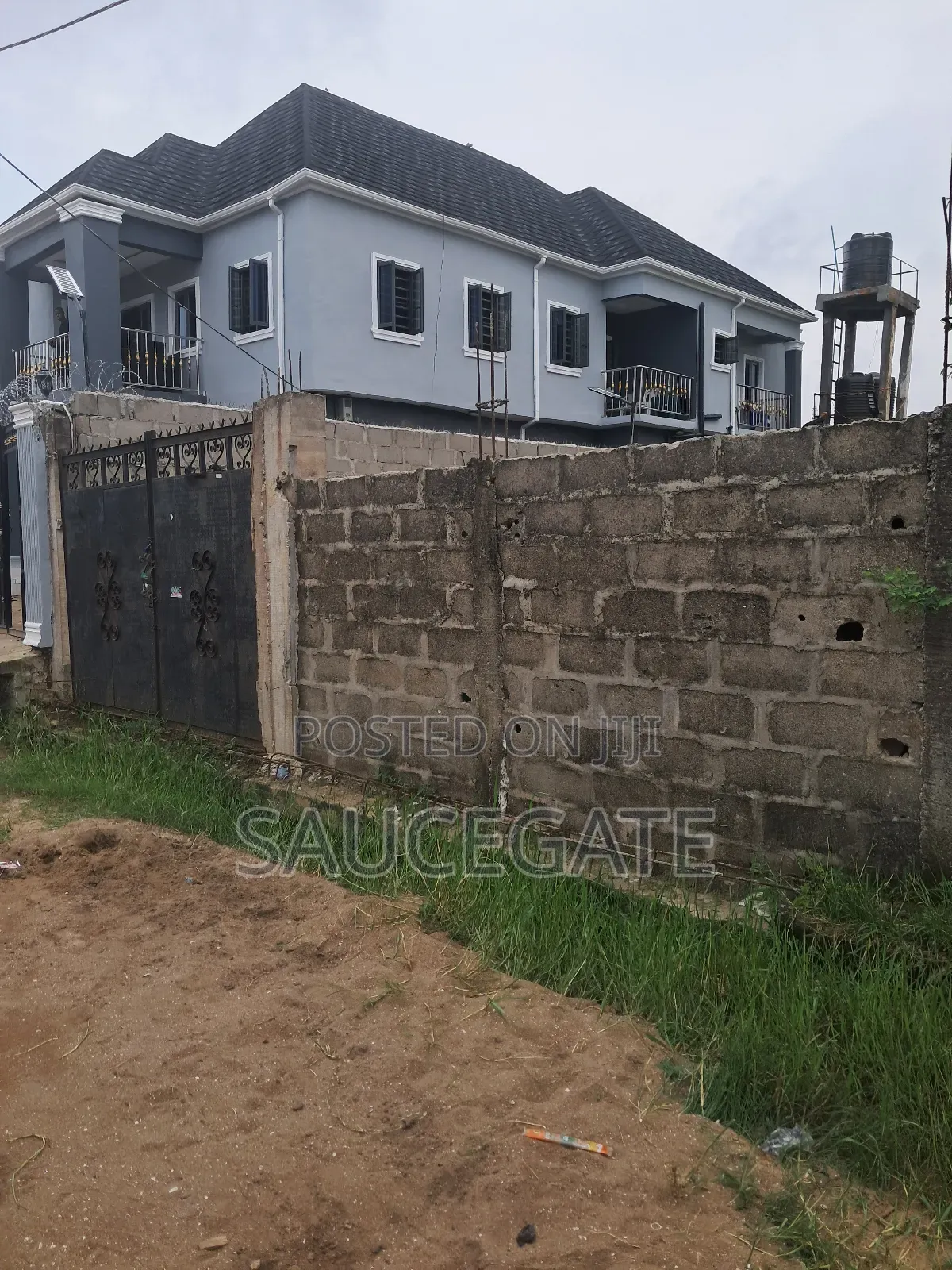 Half Plot Fenced and Gated Dry at Ijegun Satellite Good