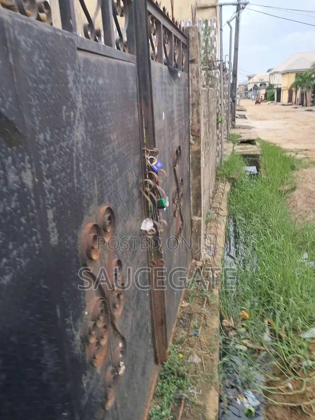 Half Plot Fenced and Gated Dry at Ijegun Satellite Good