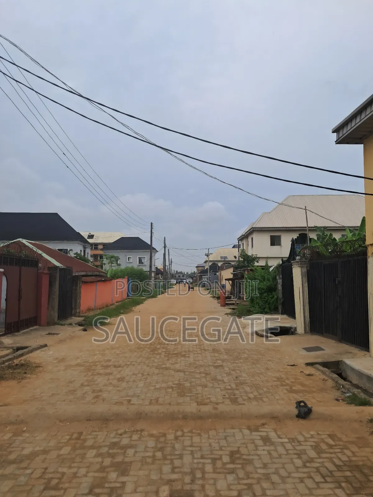 Half Plot Fenced and Gated Dry at Ijegun Satellite Good