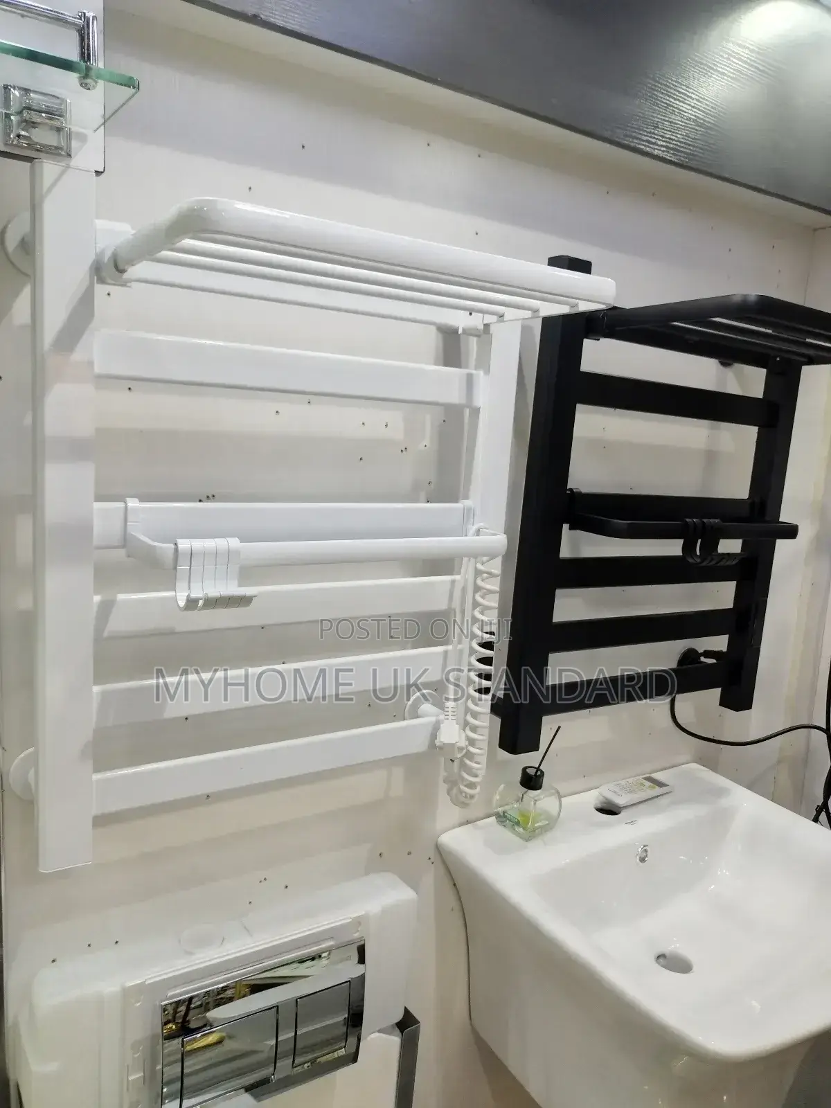 Wall-Mounted Heated Towel Rack With a Top Shelf