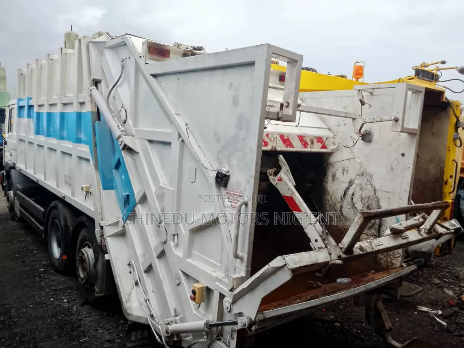 Man Garbage Compactor