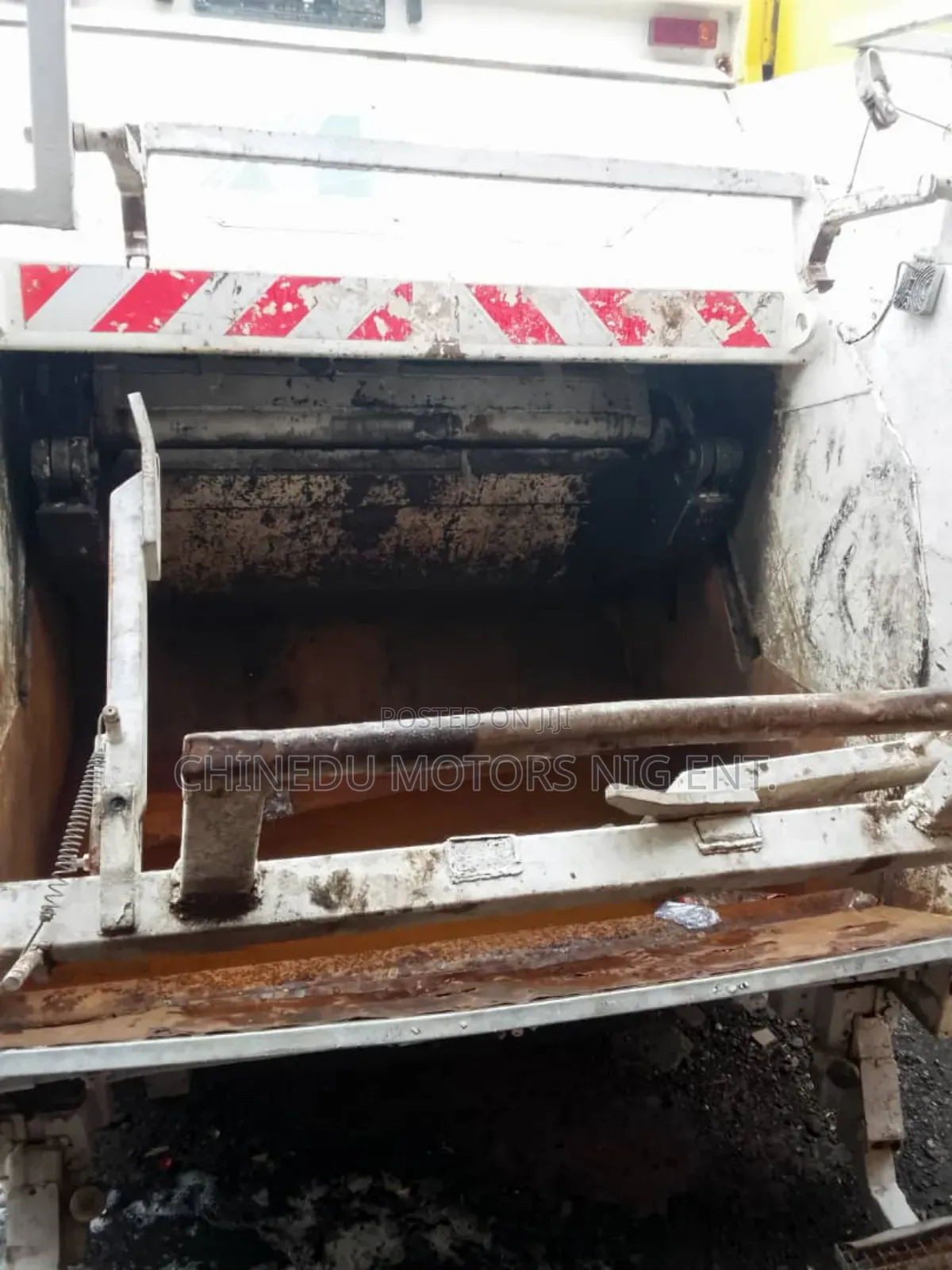 Man Garbage Compactor