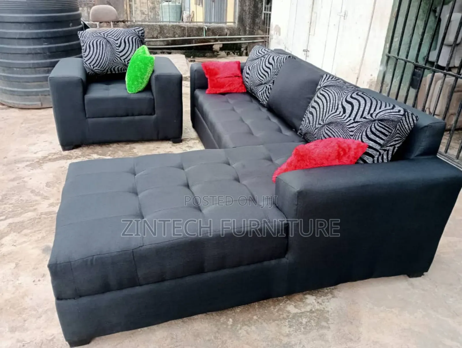 Black L Shape Sofas With Throw Pillows