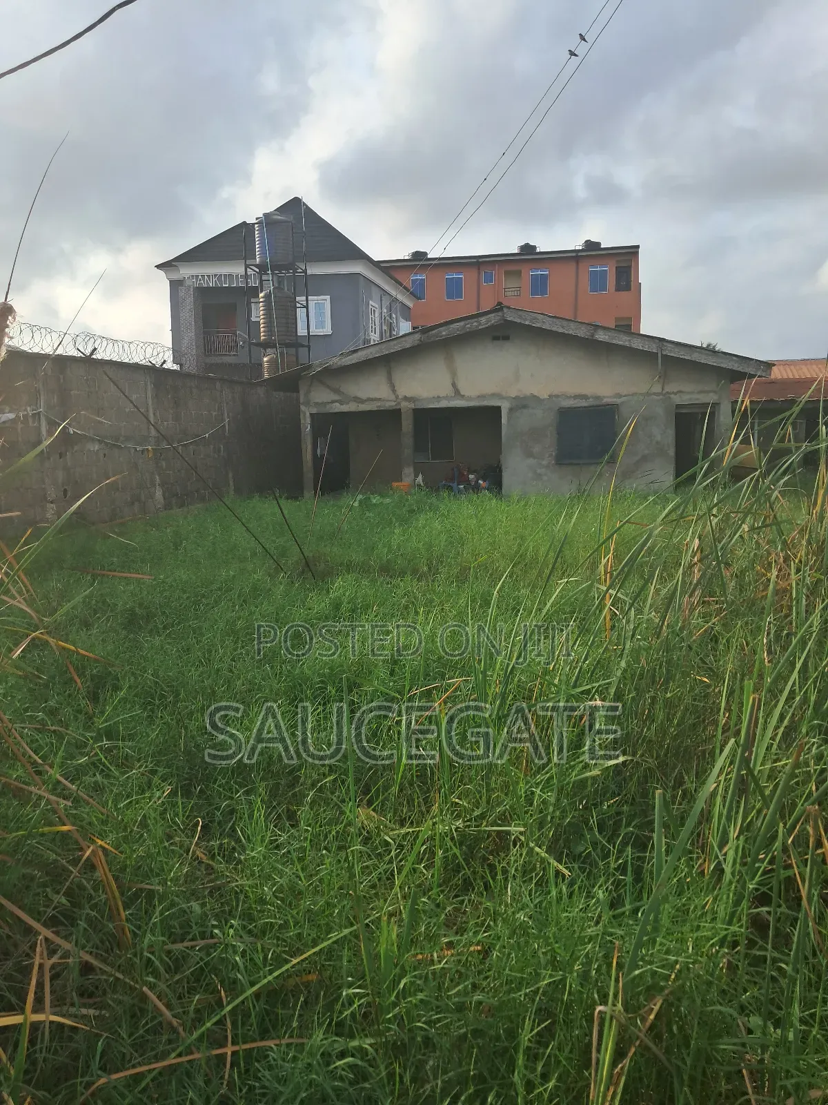 Half Plot for Sale With Old Bungalow at Ijegun Satellite