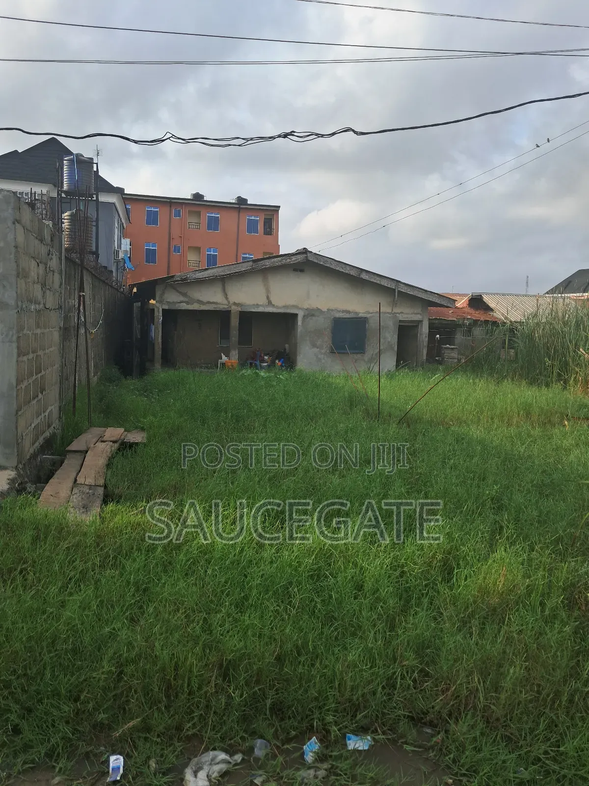 Half Plot for Sale With Old Bungalow at Ijegun Satellite