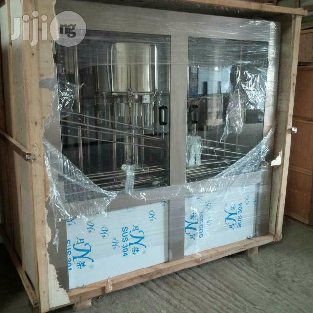 Automatic Bottle Water Filling Packaging Machine