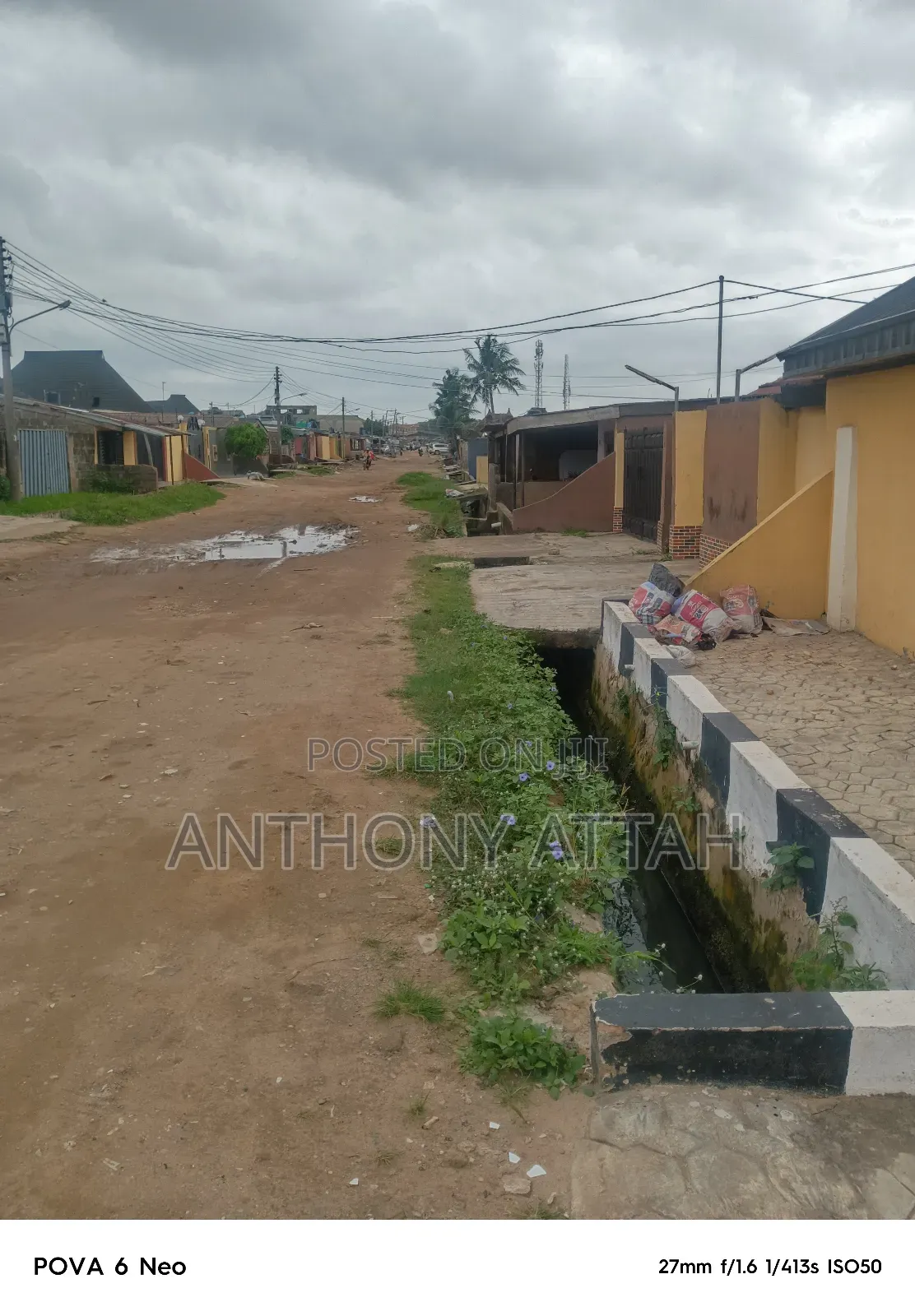 An Half Plot of Land Fenced Gated at Ipaja