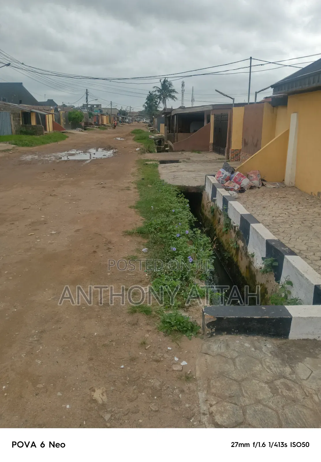 An Half Plot of Land Fenced Gated at Ipaja