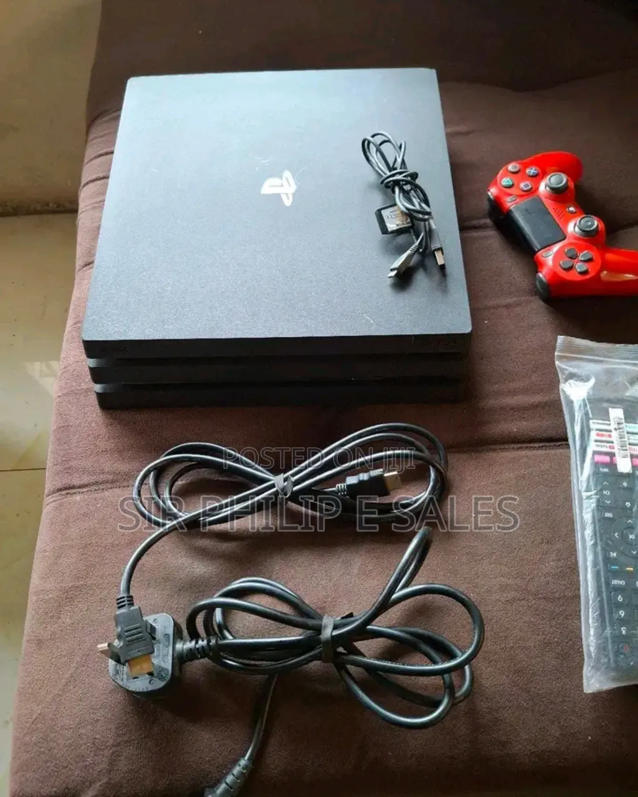 Good as New Playstation 4 + 4 Latest Game's