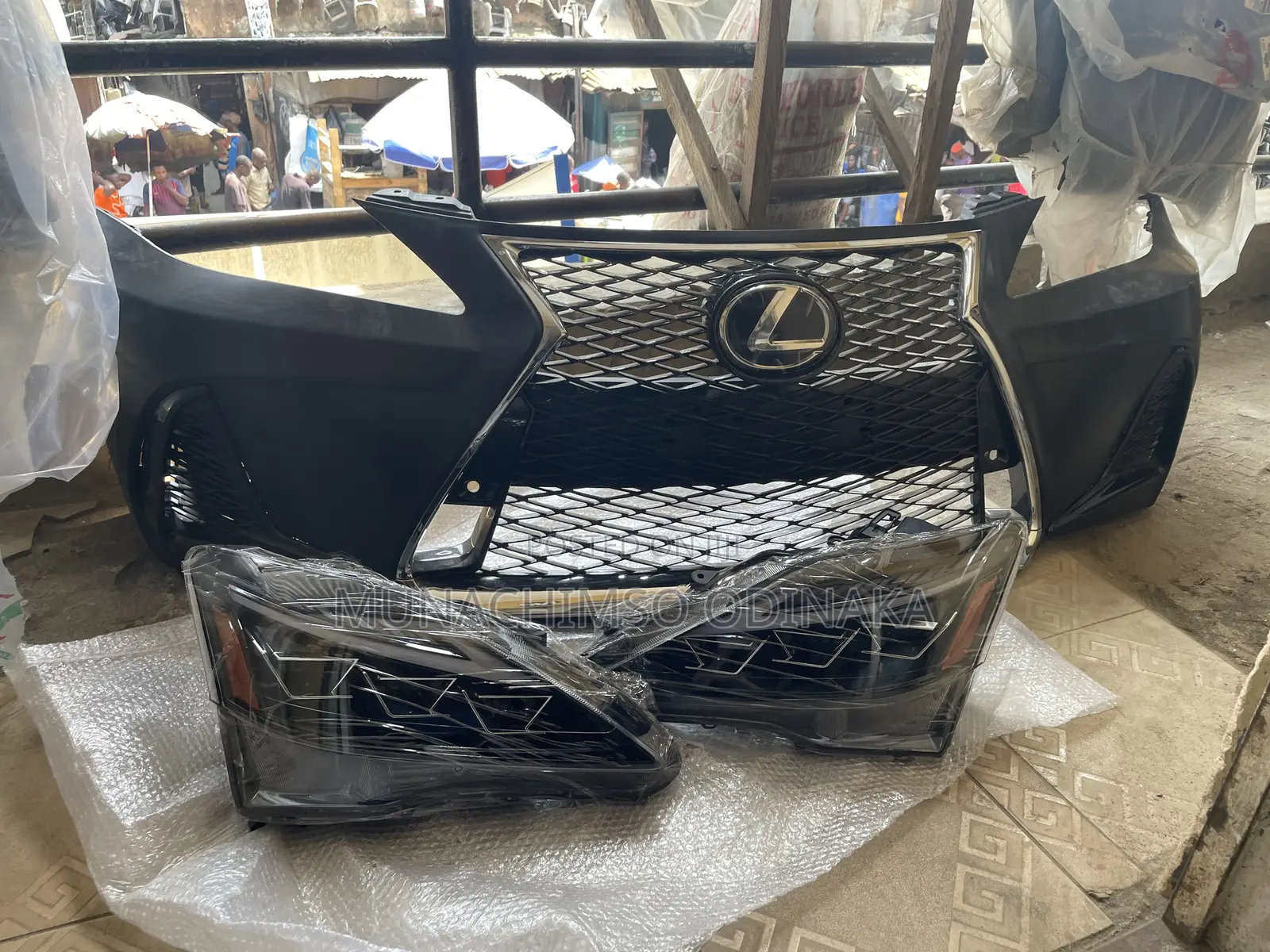 Complete Front Bumper and 3torch Headlamp Is250