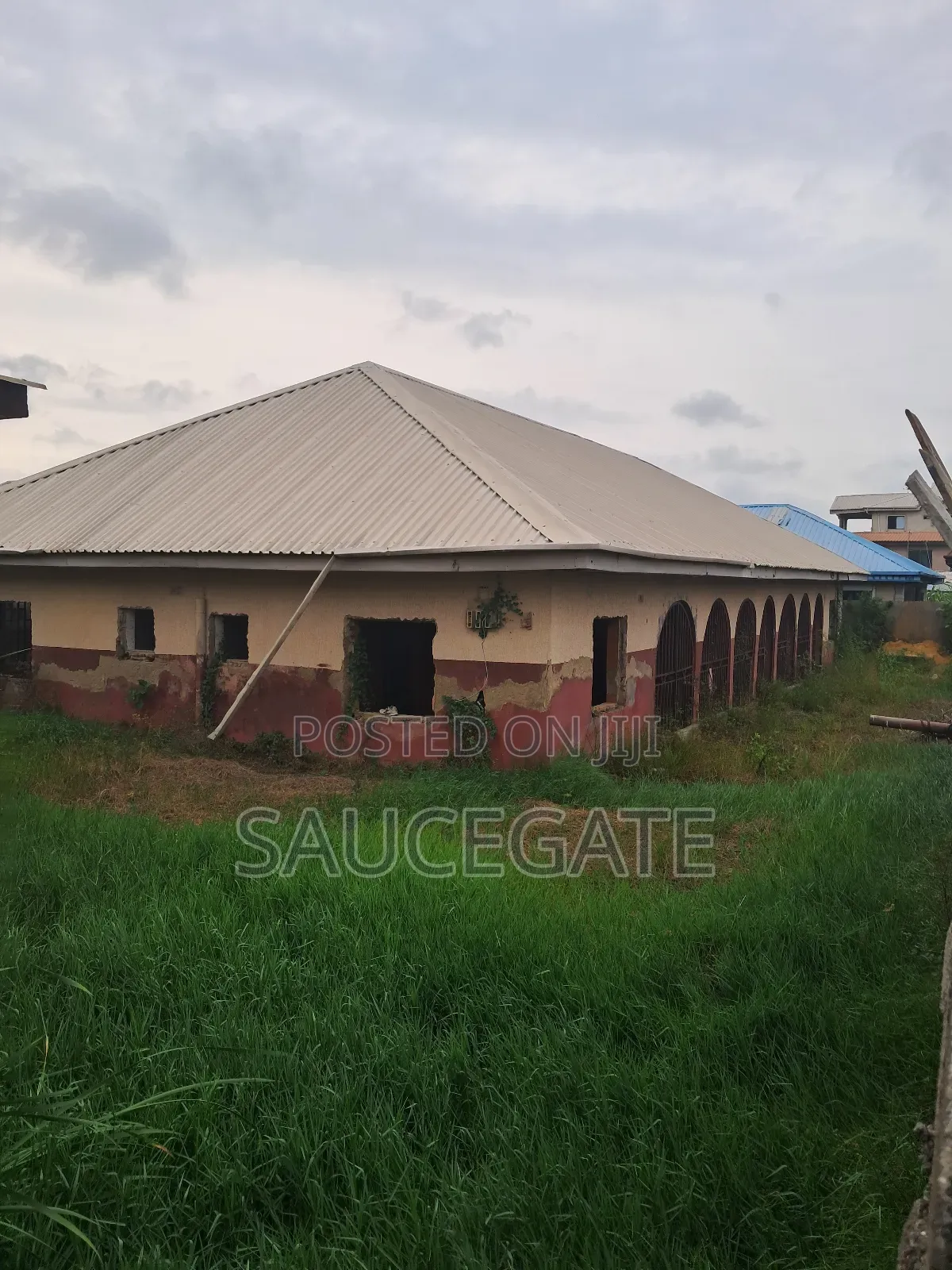 A Land With an Old Demolisbale Building at Ijegun Good Deal