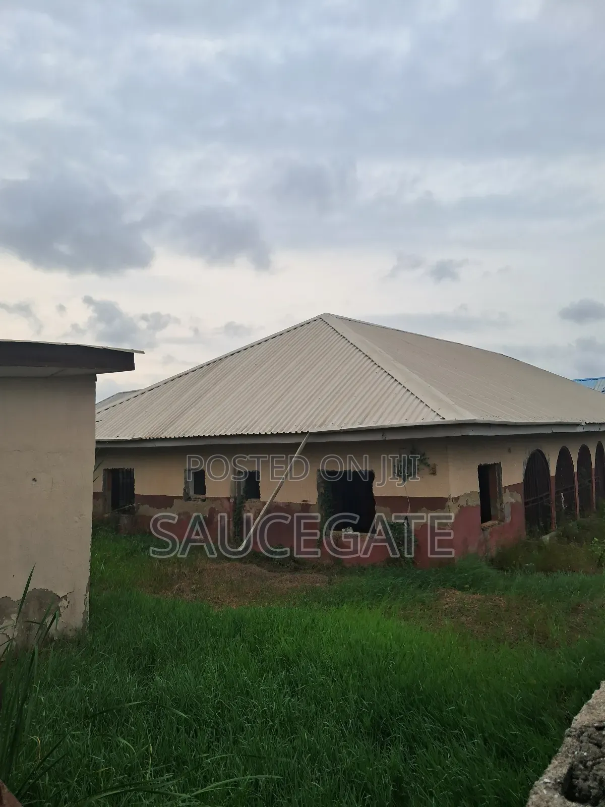 A Land With an Old Demolisbale Building at Ijegun Good Deal