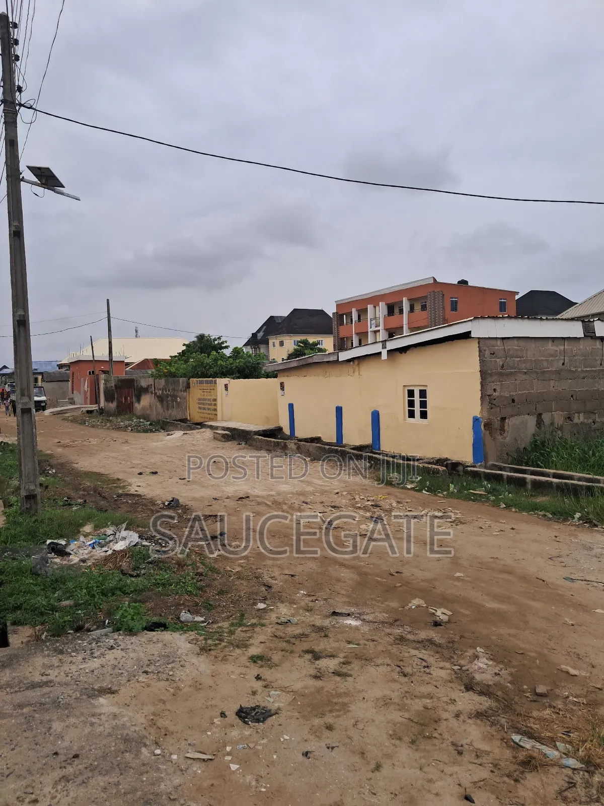 A Land With an Old Demolisbale Building at Ijegun Good Deal