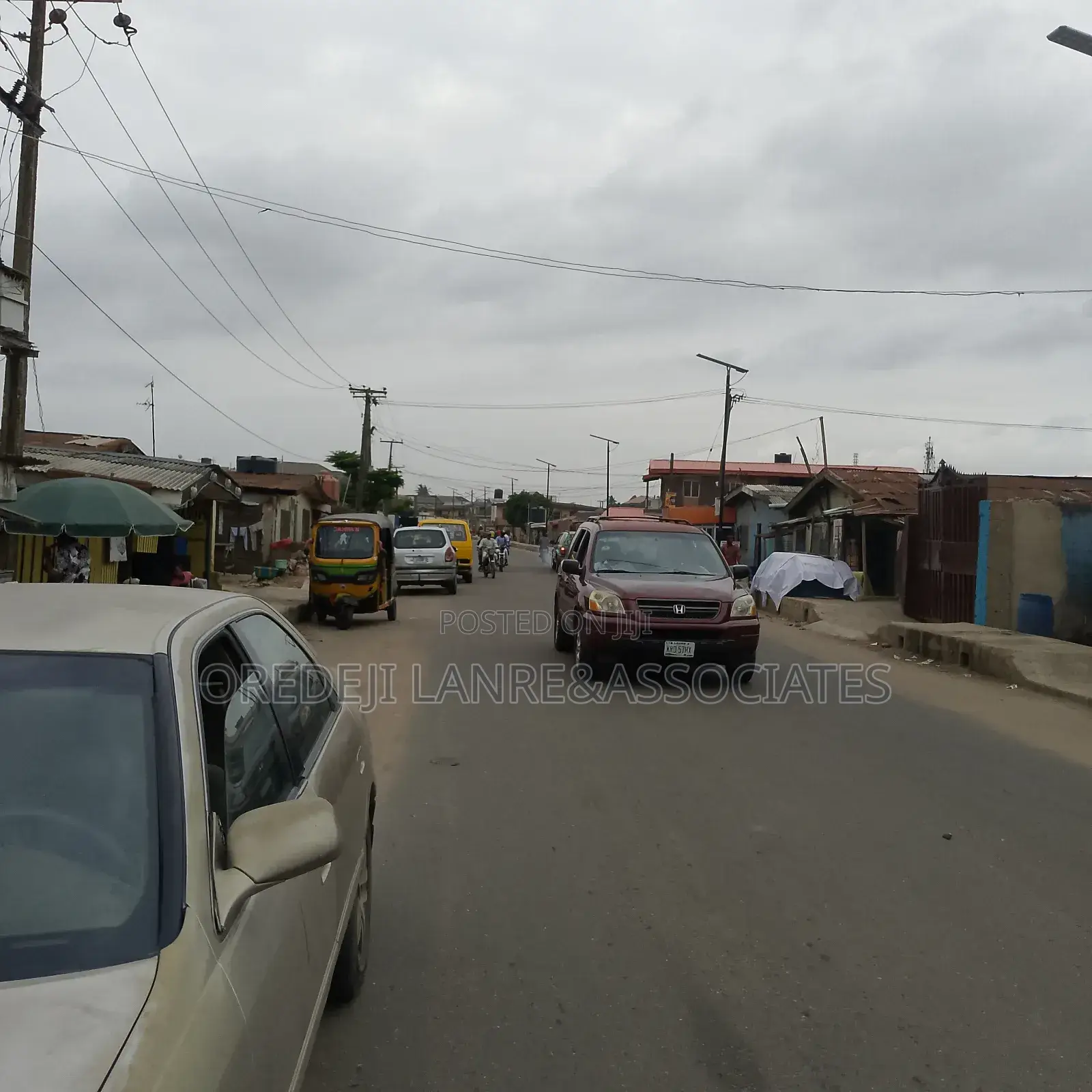 Multi-Useful Commercial Plot Facing Tarred Road at Agege