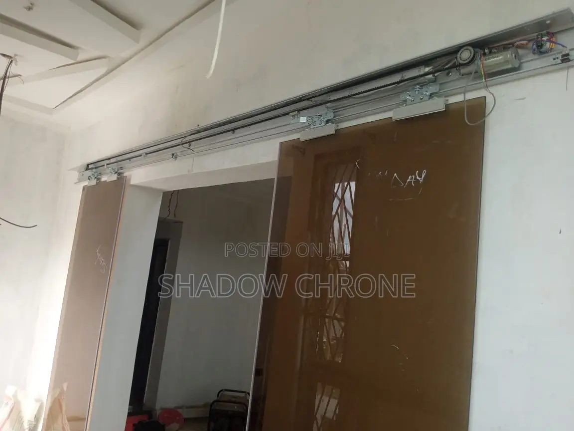 Double Panel Sliding Door-motorized Overhead Track System.