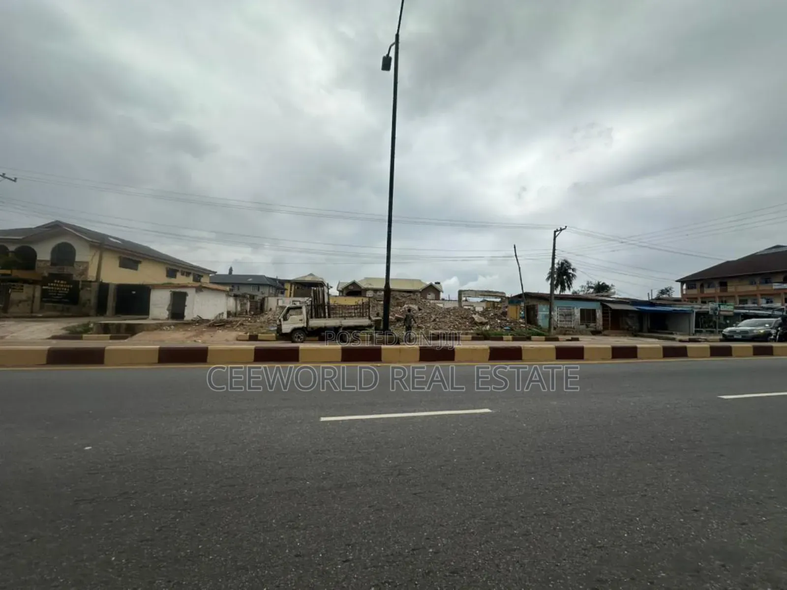 Commercial 2 Plot of Land Facing the Main Idi Ape Road