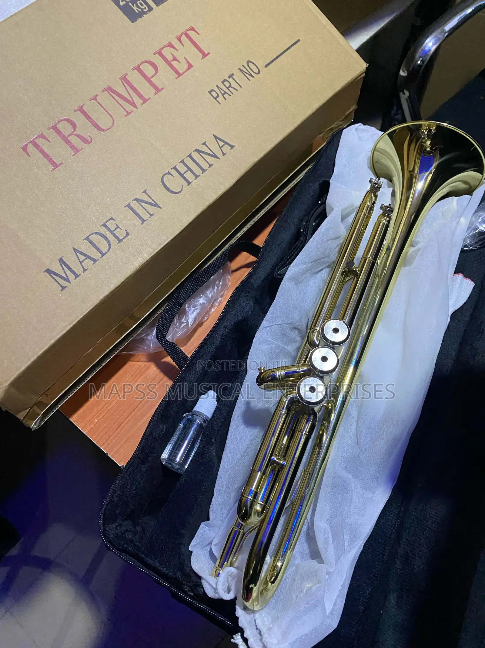 Gold-Colored Yamaha Trumpet With Accessories