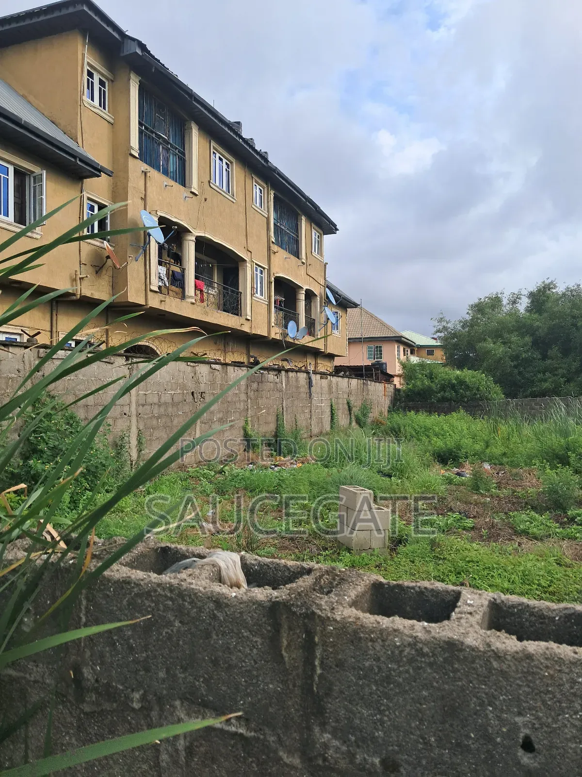 Full Plot at Site a Satellite Town With C of O Fenced Gated