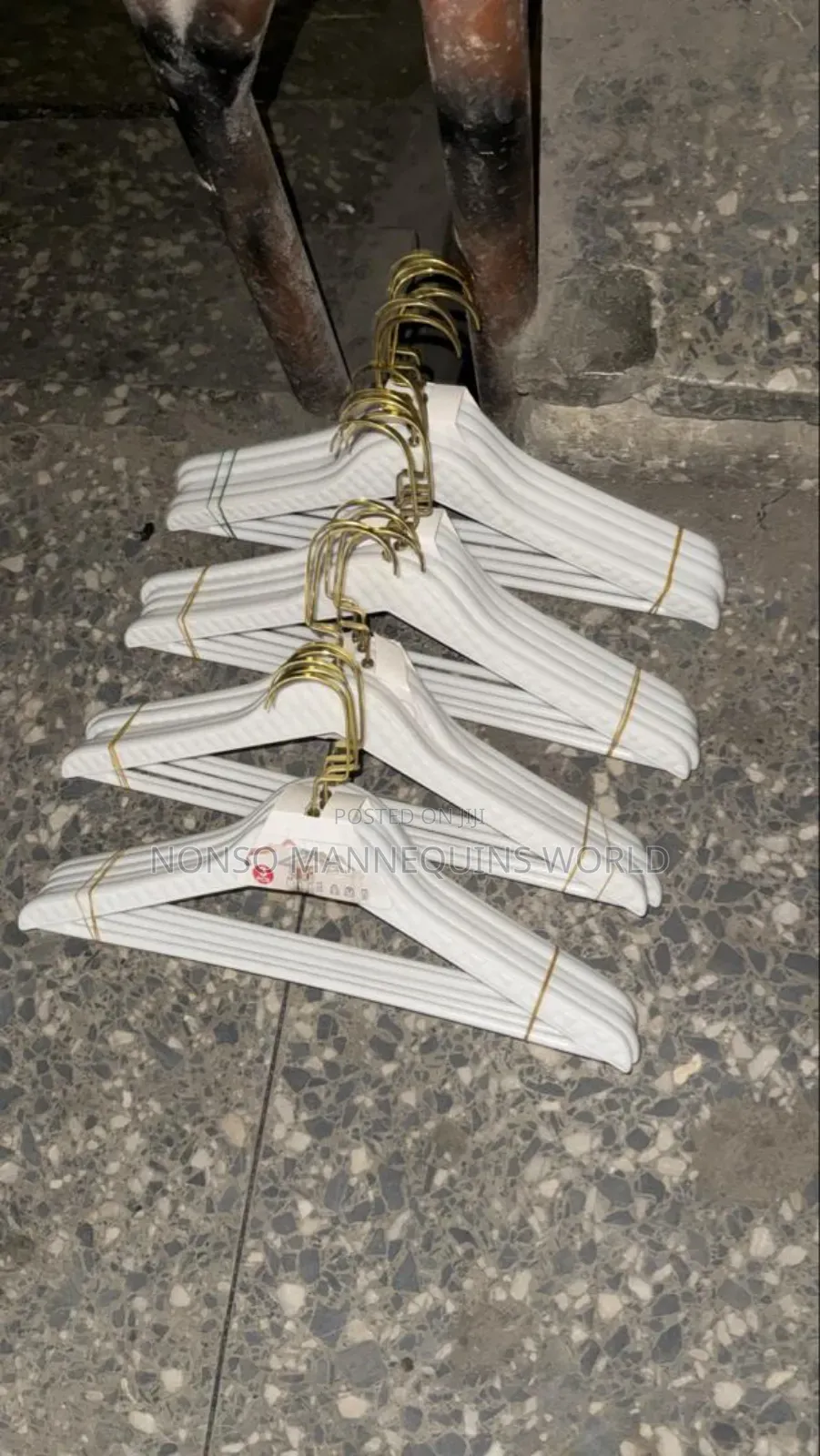 White Hangers With Golden Heads
