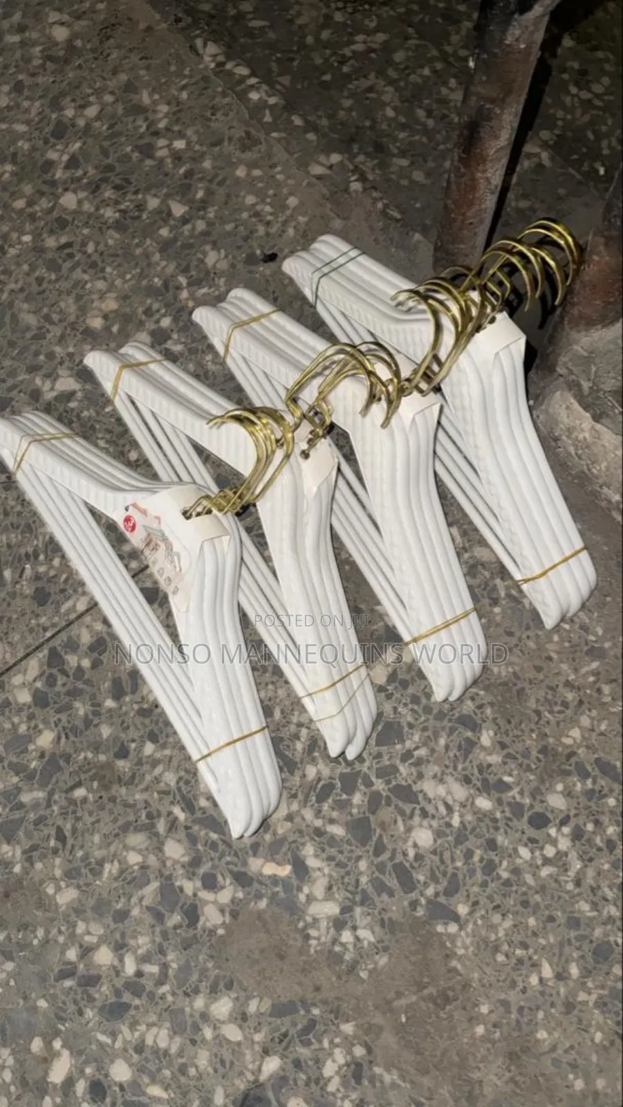 White Hangers With Golden Heads