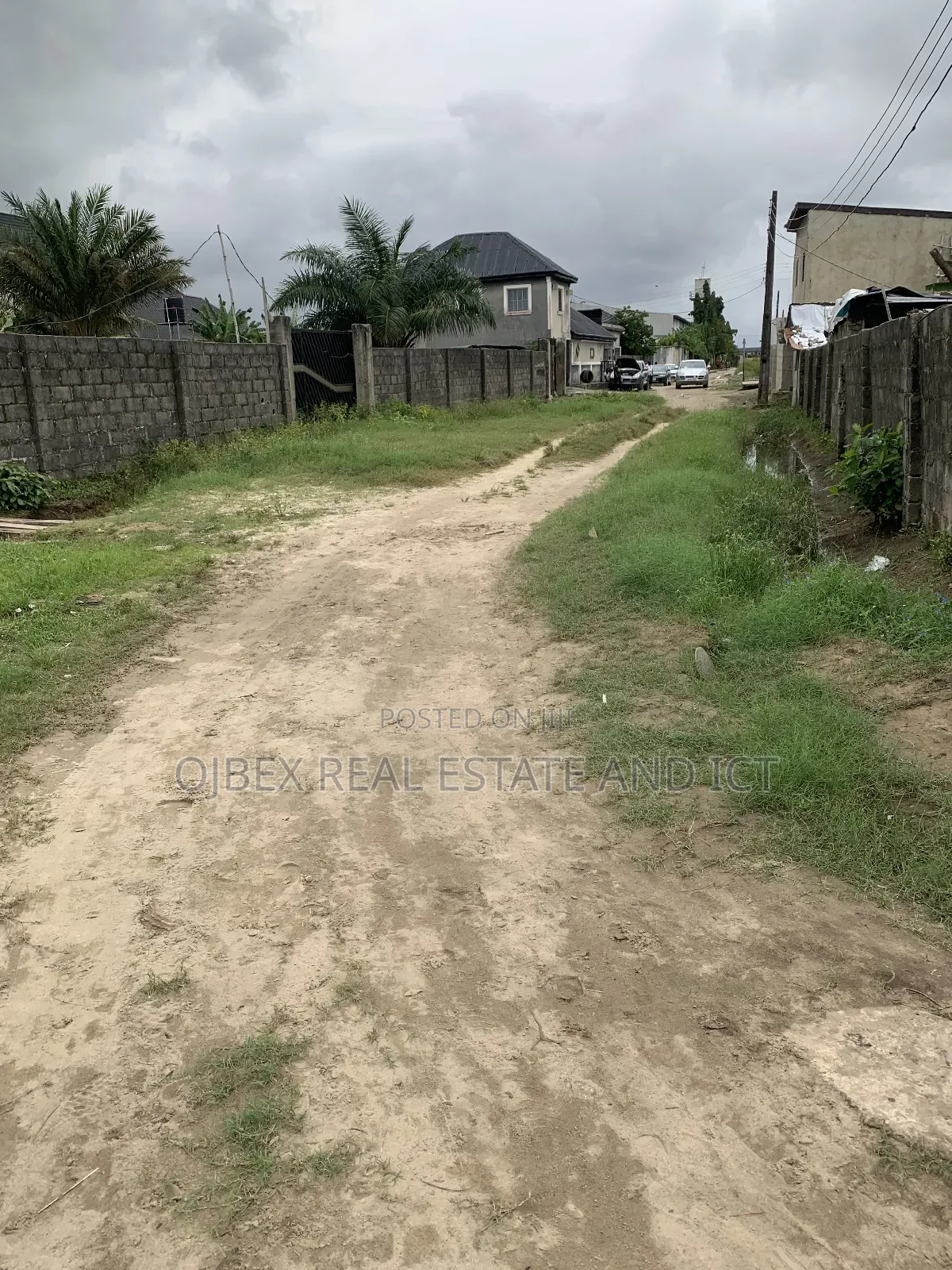 Half Plot of Land With C of O