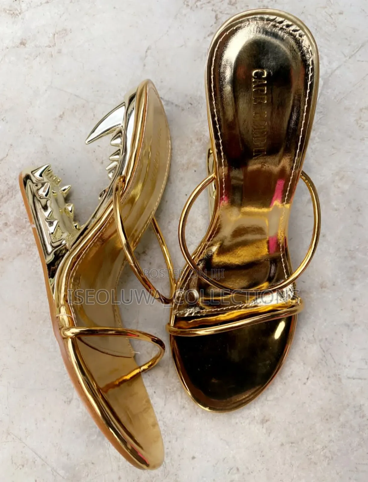 Gold Strappy High Heel Sandals With Studded Heel.