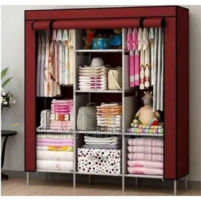 Strong Multilayered 3 Compartment Mobile Wardrobe With Cover Clothe
