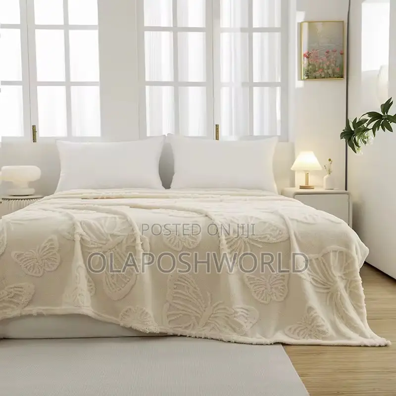 Creamy Posh Drape Sofa Blanket