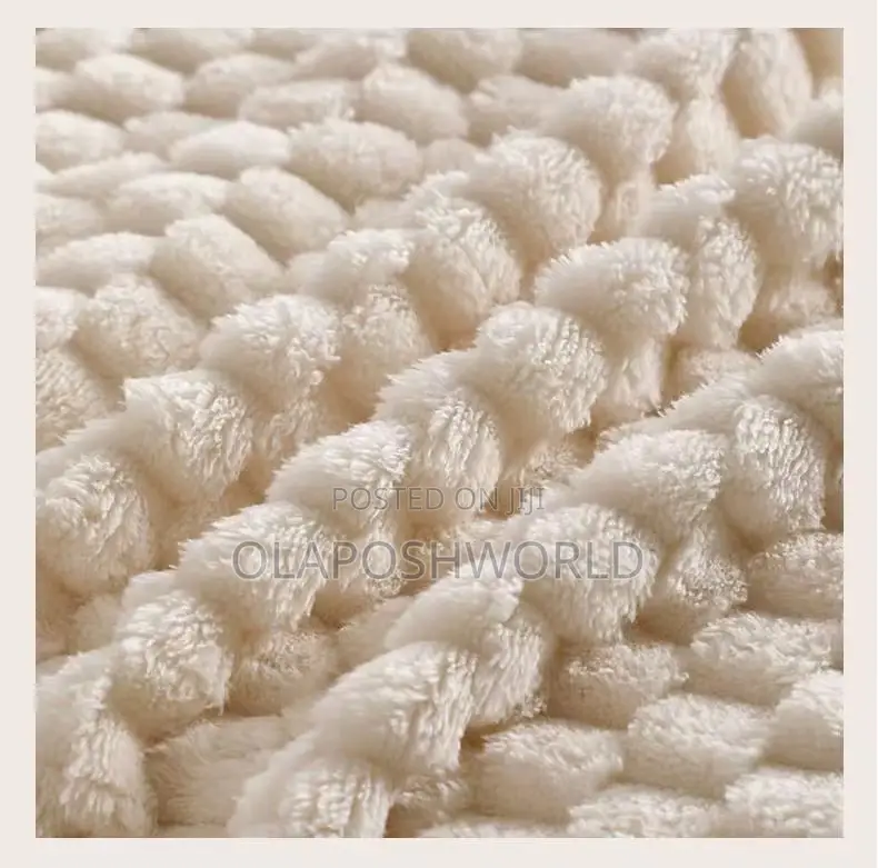 Creamy Cozyloom Sofa Blanket