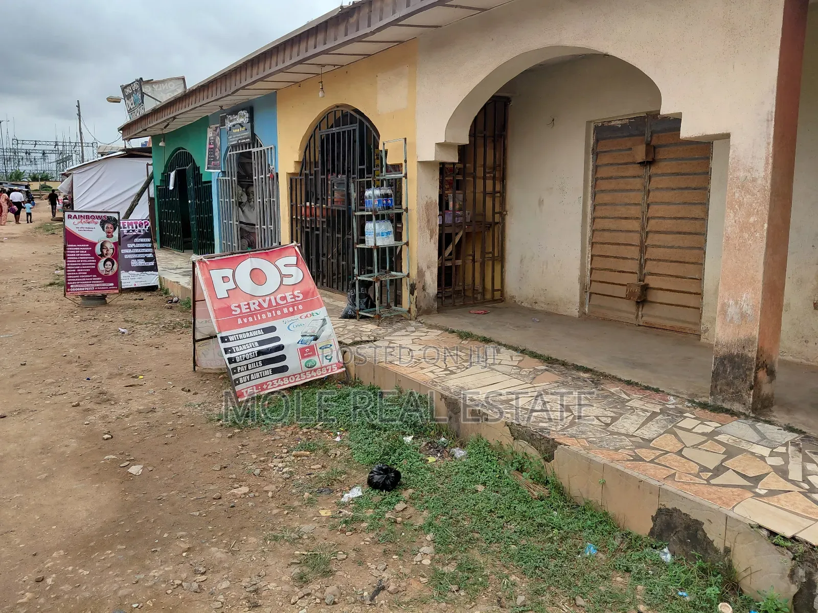 Full Plots Ayobo With 4 Lockup Shops in Fron