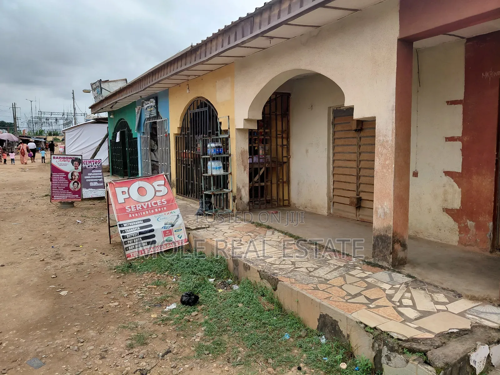 Full Plots Ayobo With 4 Lockup Shops in Fron