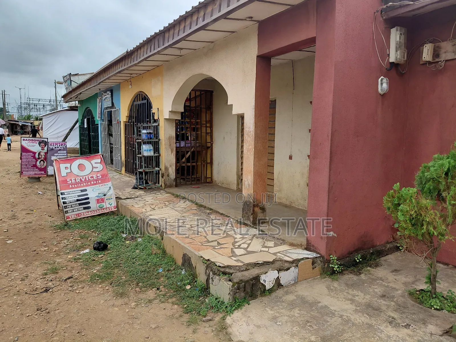 Full Plots Ayobo With 4 Lockup Shops in Fron