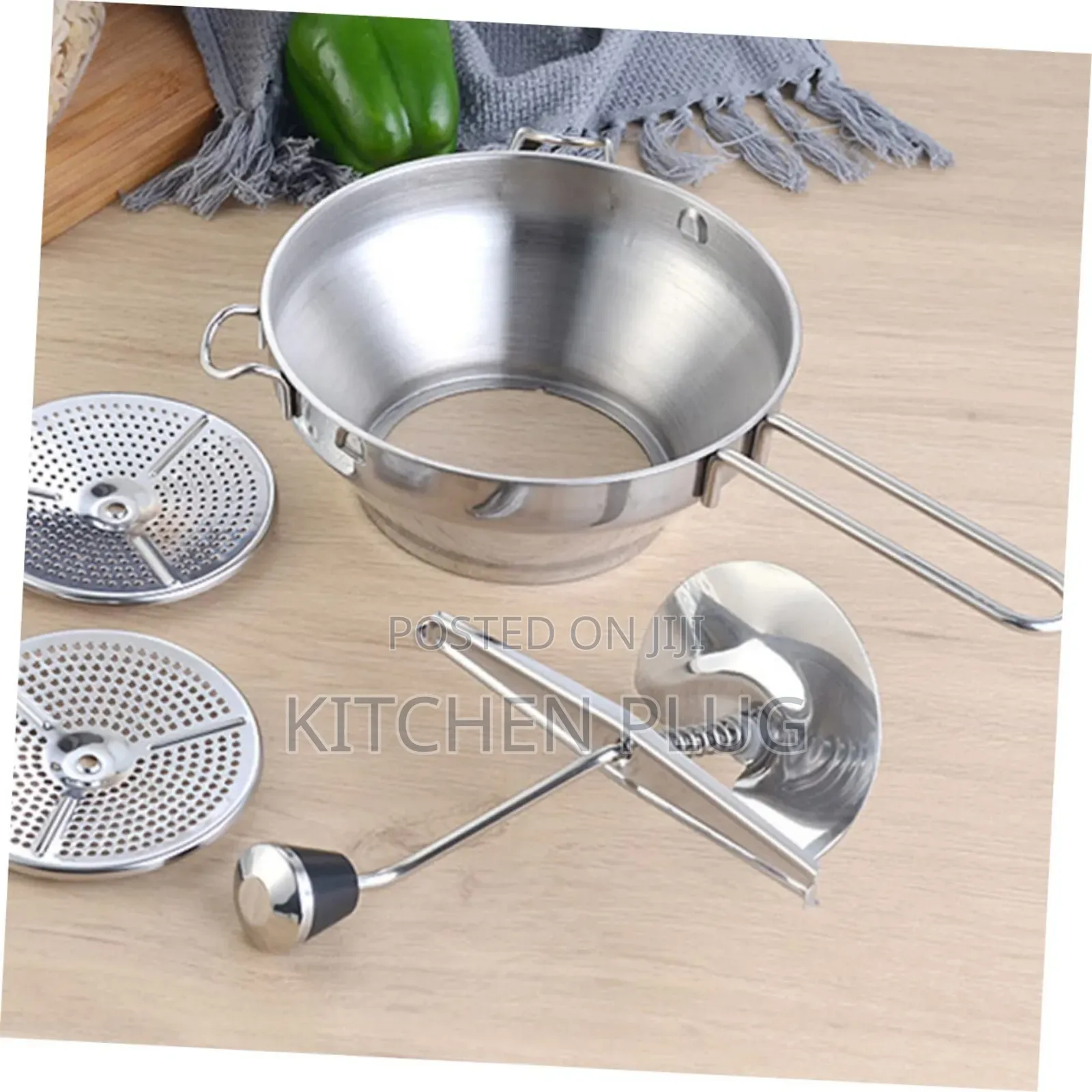 Stainless Steel Potato Ricer, Also Known as a Food Mill or Masher,