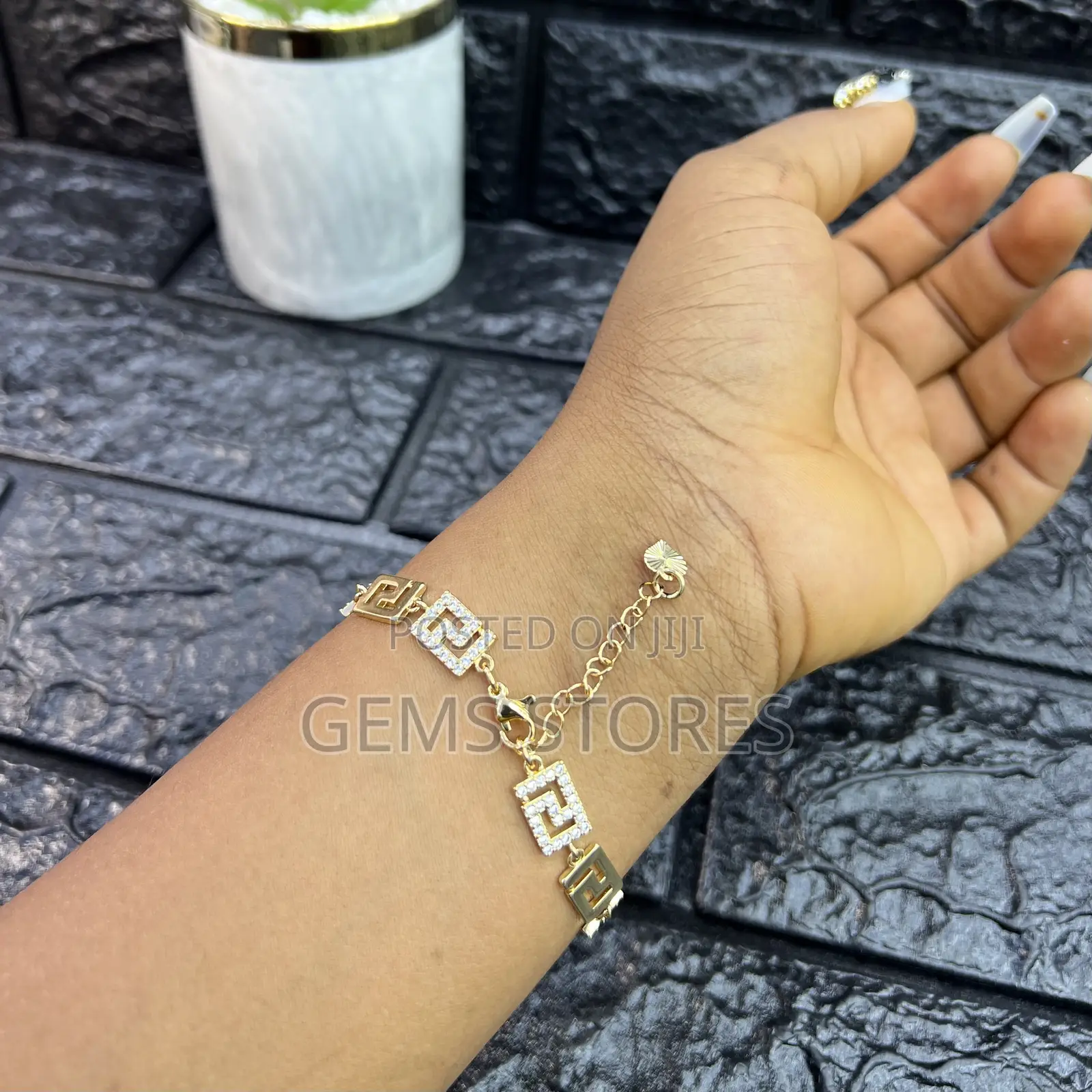 Luxurious Gold-Toned Bracelet With Medusa Medallion Crystal Details