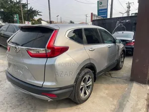 Honda CR-V Touring 4dr SUV AWD (1.5L 4cyl CVT) 2017 Gray
