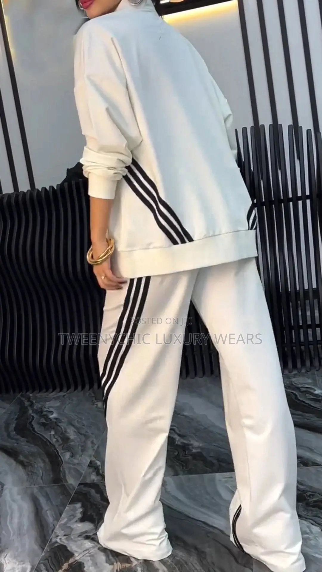 Bandeau Neckline (Strapless Tube Top) Under a Zip-Up Track Jacket.