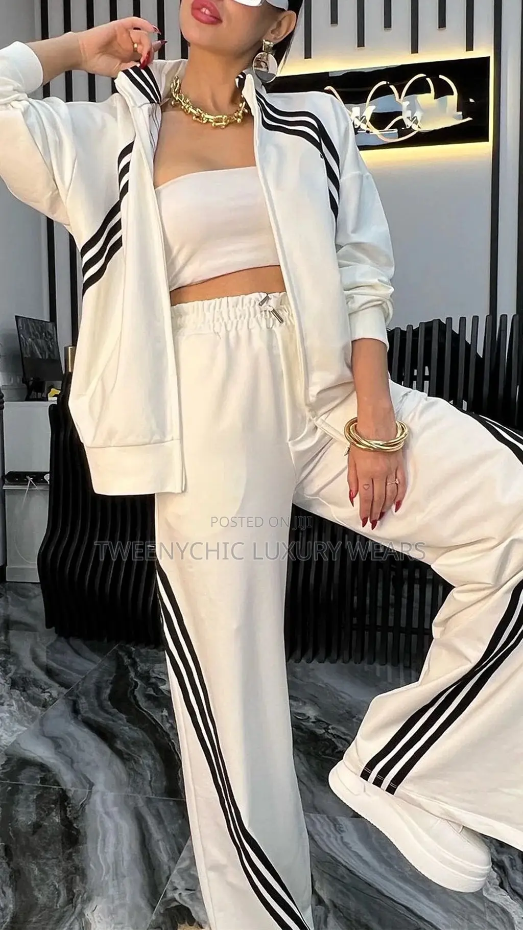Bandeau Neckline (Strapless Tube Top) Under a Zip-Up Track Jacket.