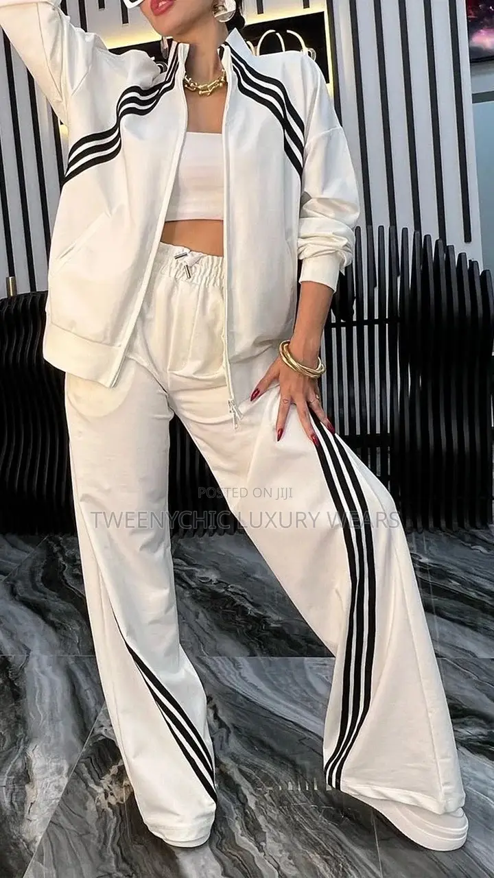 Bandeau Neckline (Strapless Tube Top) Under a Zip-Up Track Jacket.