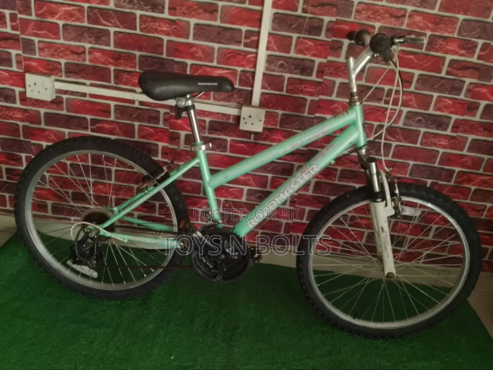Size 24 Green Roadmaster Bicycle With Front Shocks