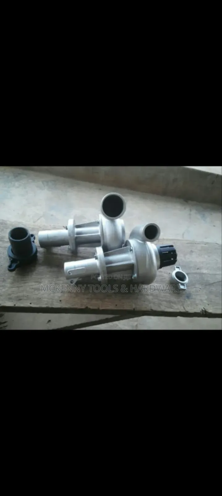 Water Pump Attachment For A Brush Cutter.